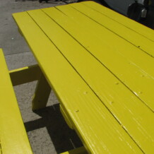 bright yellow picnic table